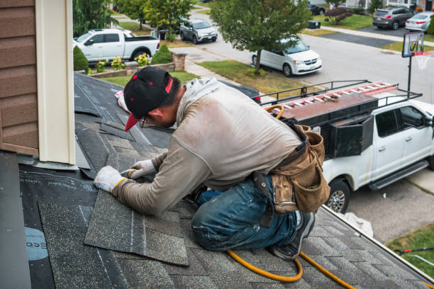 Professional Roofing technician working in Buckley, MI